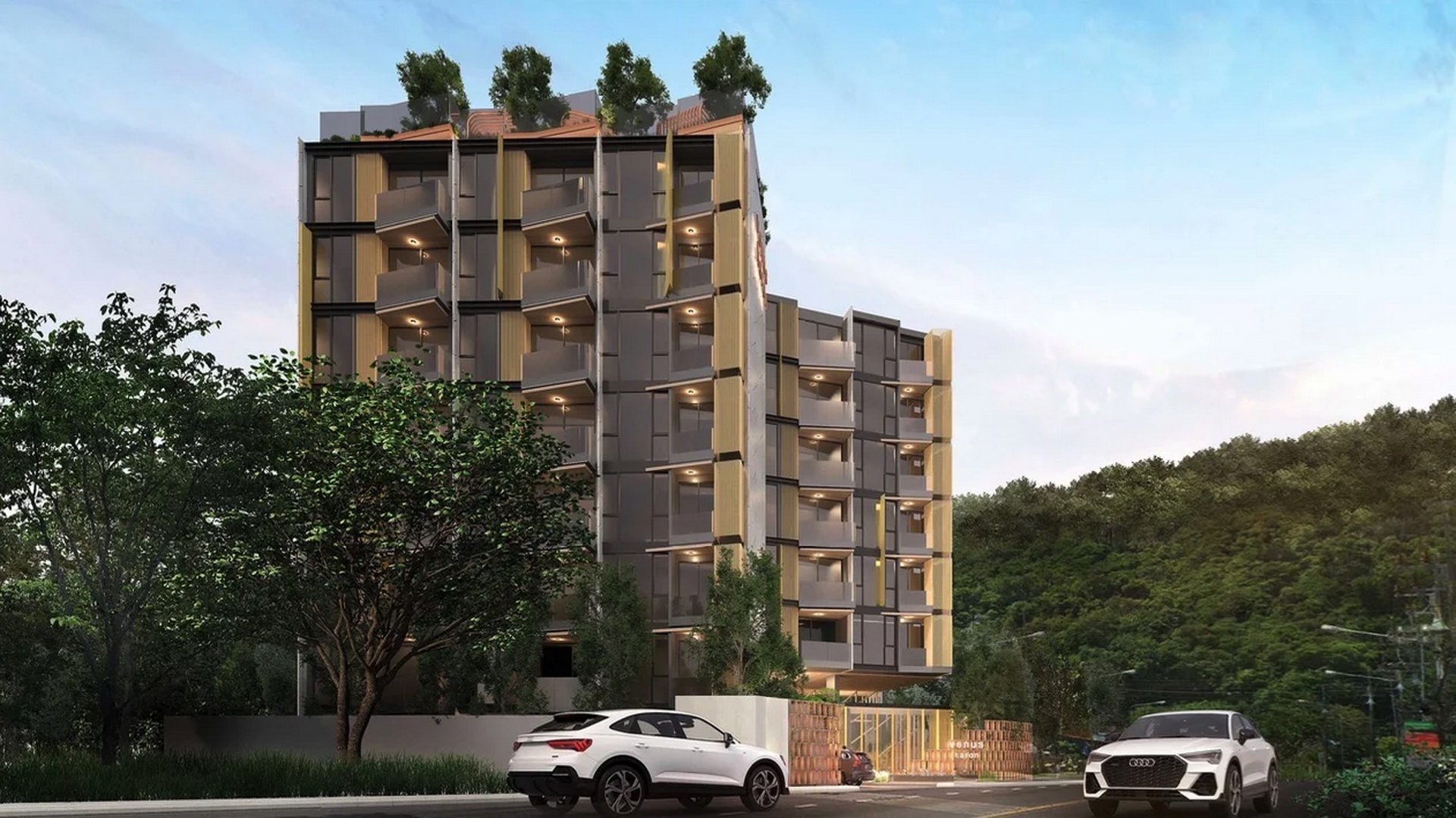 VIP Venus Karon — full building view from across the street with rooftop garden